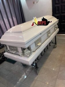 dome white casket with silver last supper handle